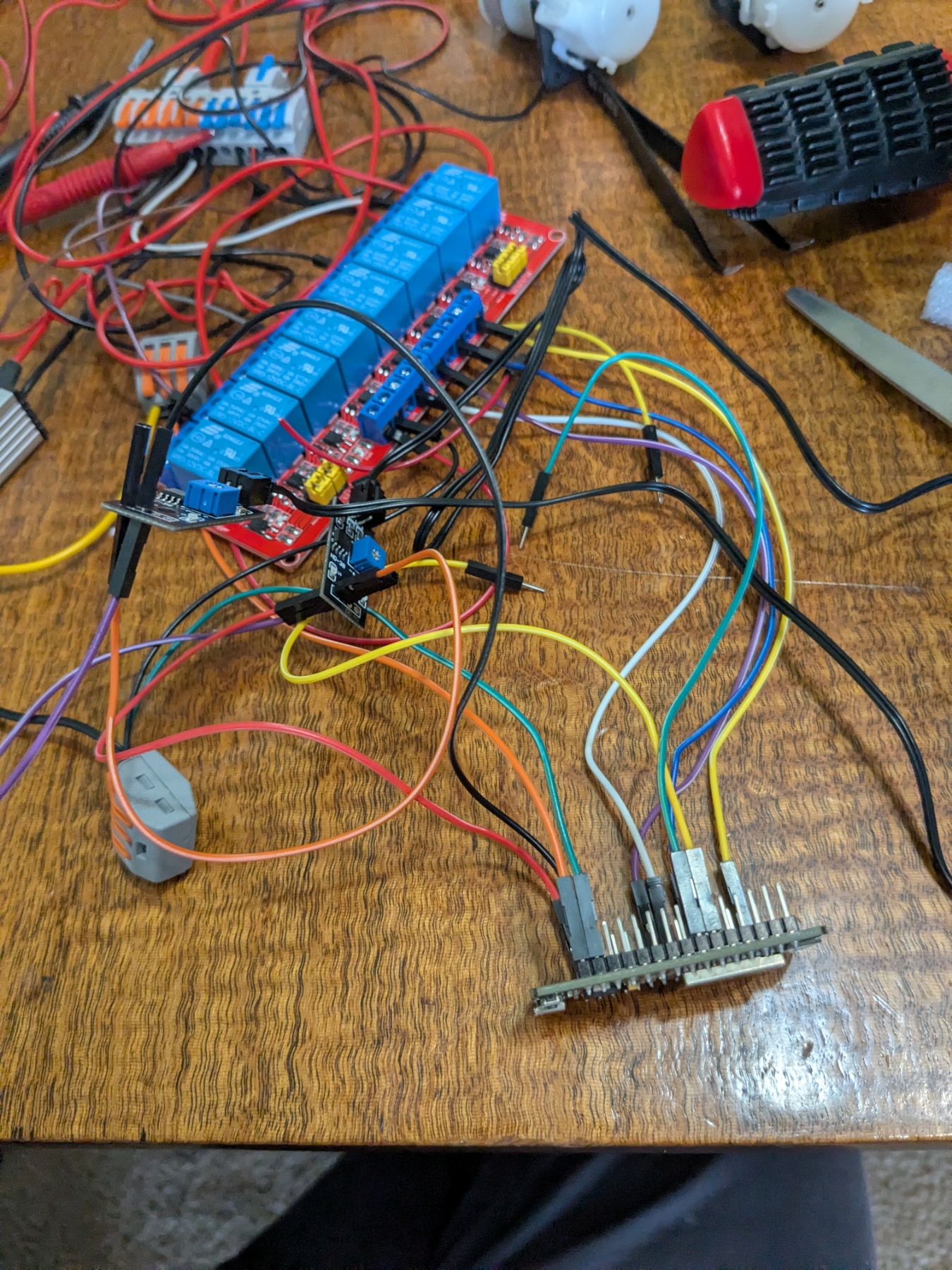 Relay hooked up to an ESP-32 on its side